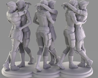 May include: A 3D printed figurine of two figures embracing each other. The figures are in a gray color and are standing on a circular base.