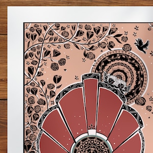 May include: A red and black mandala design with a floral border. The mandala is made up of concentric circles and petals. The floral border features black roses and leaves on a peach background.