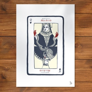 May include: A vintage-style playing card illustration of the Queen of Spades. The card features a woman in a dark blue dress with red hands, holding a dagger. The card is titled "Shakespeare Macbeth" and has a black spade symbol in the bottom right corner.