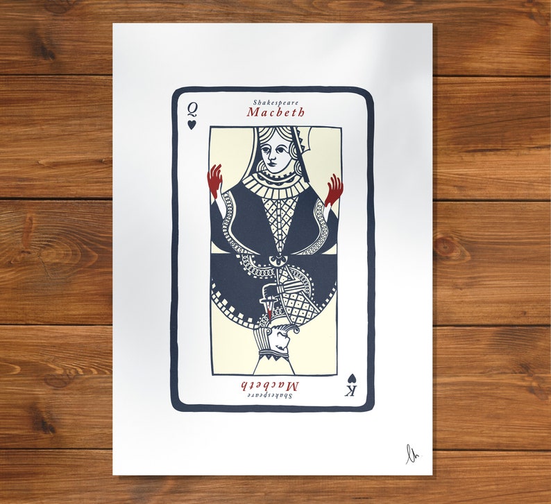 May include: A vintage-style playing card illustration of the Queen of Spades. The card features a woman in a dark blue dress with red hands, holding a dagger. The card is titled "Shakespeare Macbeth" and has a black spade symbol in the bottom right corner.