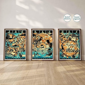 May include: Three framed art prints with a vintage aesthetic. Each print features a detailed illustration in shades of orange, teal, and black, depicting scenes from Homer's Odyssey. The frames are a warm brown, and the prints are displayed on a light wood floor.