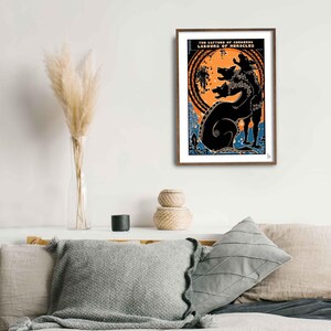 May include: A framed print of a black and white illustration of the capture of Cerberus, one of the Labors of Hercules. The illustration depicts a three-headed dog with a snake-like tail.