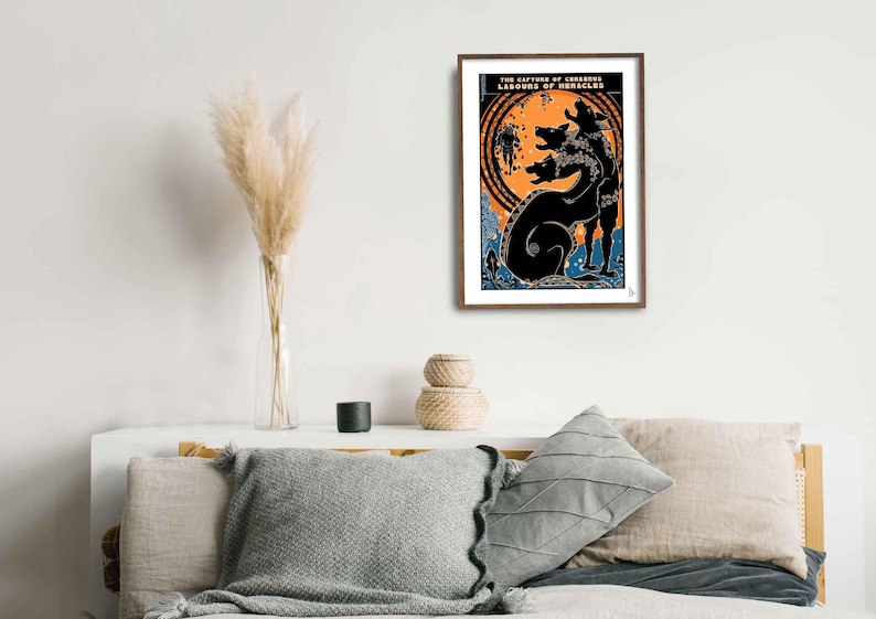 May include: A framed print of a black and white illustration of the capture of Cerberus, one of the Labors of Hercules. The illustration depicts a three-headed dog with a snake-like tail.