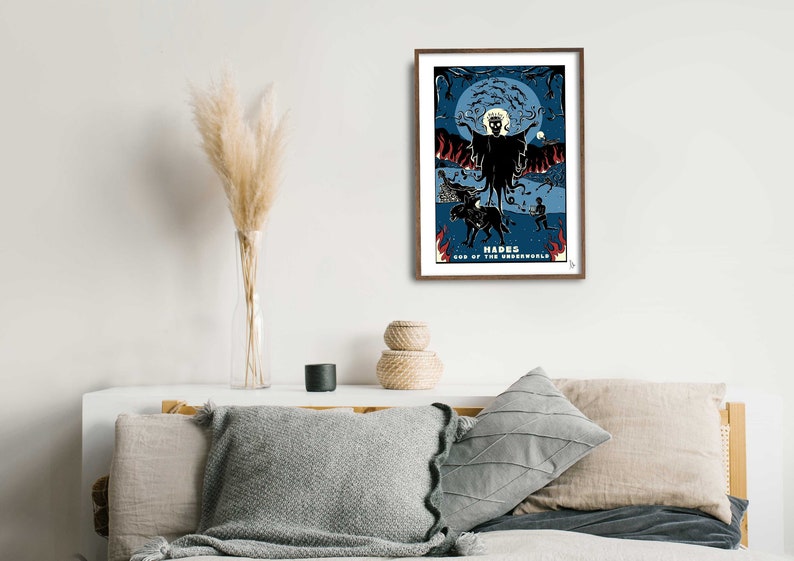 May include: A framed illustration of Hades, the Greek god of the underworld, depicted as a dark figure with a crown and a three-headed dog. The background is a dark blue sky with a full moon and stars. The text "Hades, God of the Underworld" is printed below the image.