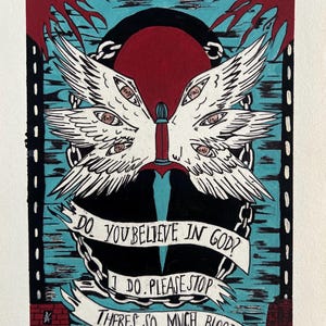 May include: An illustration with a central dagger and white wings with eyes. The artwork includes the text "DO YOU BELIEVE IN GOD? I DO. PLEASE STOP THERE'S SO MUCH BLOOD" on banners, set against a teal and red backdrop.