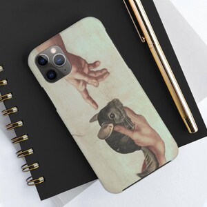May include: A phone case with a parody of Michelangelo's "The Creation of Adam" featuring a chinchilla. The design shows two hands reaching out, one holding the chinchilla. The case has a light beige background and a matte finish.