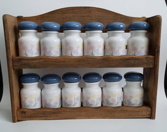 Vintage 90's era spice rack with ceramic jars, vintage decor