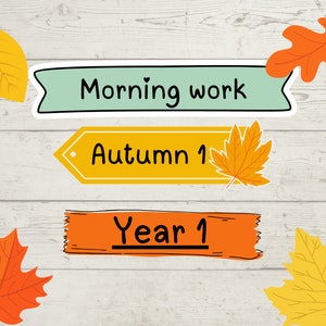 May include: A set of three colourful labels with autumn leaves. The top label is teal and says "Morning work". The middle label is yellow and says "Autumn 1". The bottom label is orange and says "Year 1".