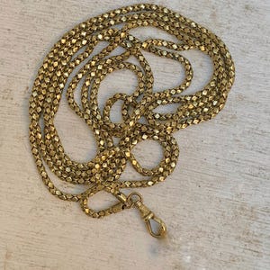 アンティークのビクトリア朝時代の金メッキが施された金属製ガードチェーン、長さ約56インチ