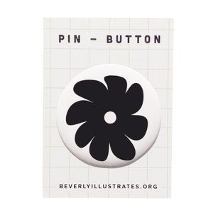 May include: Black and white pin button featuring a stylized flower design. The text "PIN - BUTTON" is printed above the flower and "BEVERLYILLUSTRATES.ORG" is printed below the flower.