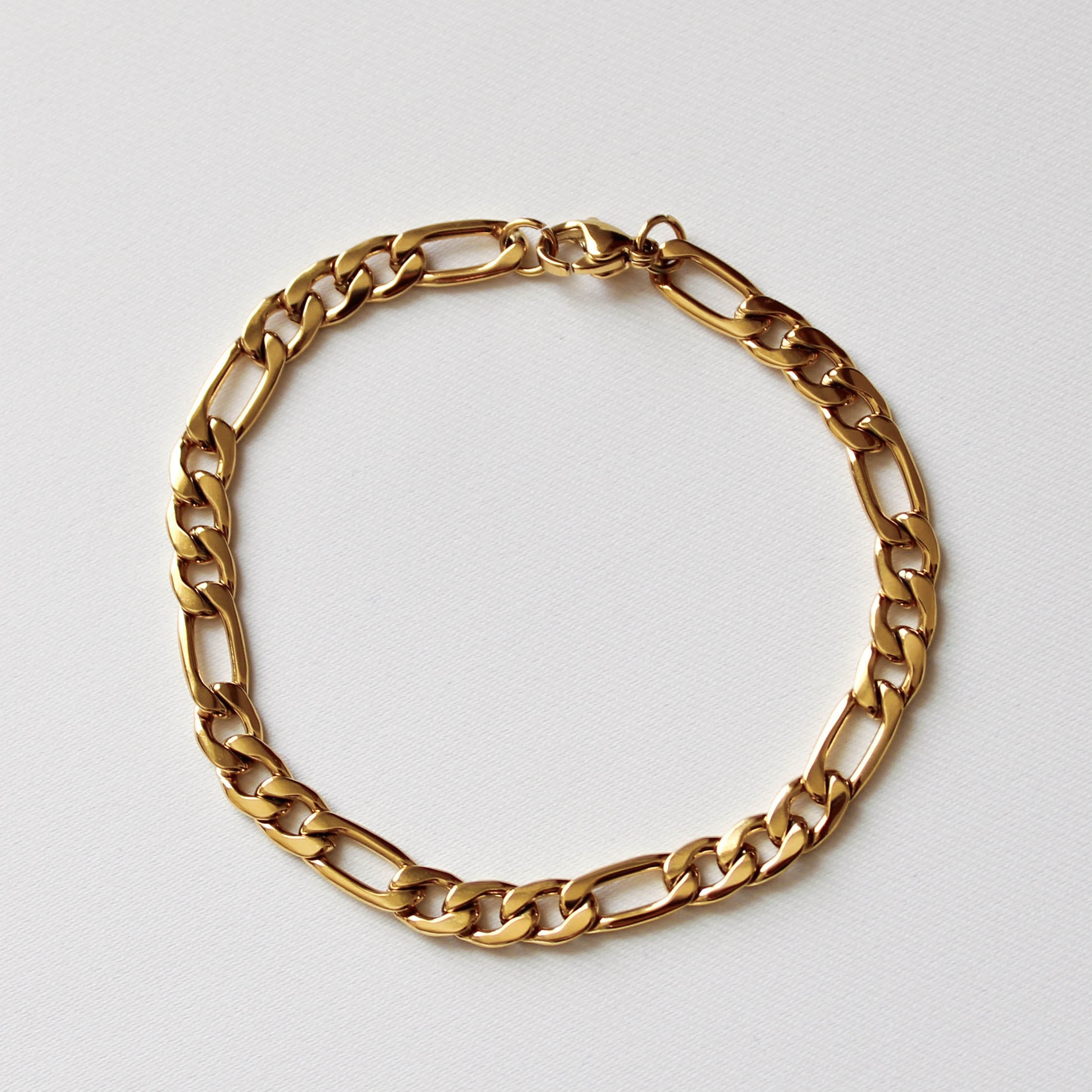 9ct Gold ID Figaro Bracelet – The Goldsmiths Gallery Limited