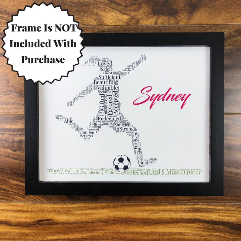 word art with words in the shape of a female soccer player and colored black. Ground below is green. Hot pink name printed beside player. The words in the print remind her of identity in Christ - God’s masterpiece, valuable, loved, forgiven, etc