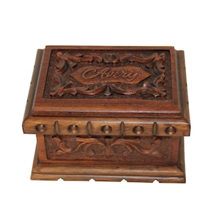 4 step puzzle box featuring a hidden key in a secret compartment, hand carved personalization, large locking storage area, interior velvet