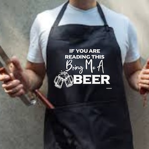 May include: Black apron with white text that reads "If you are reading this bring me a beer" with a graphic of two beer mugs.