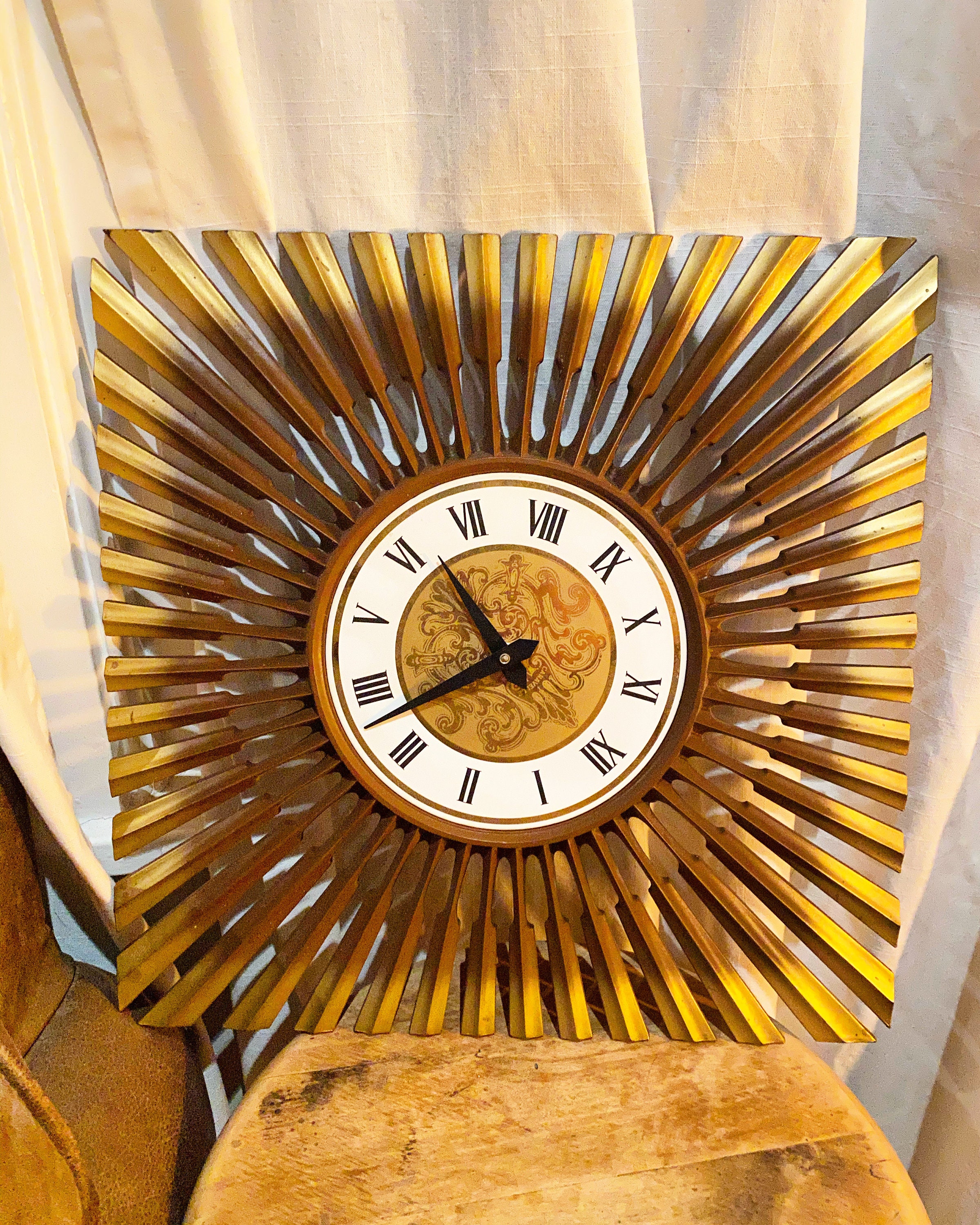Very Vintage bronzed starburst clock / sunburst clock Etsy