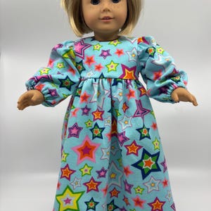 18 inch Doll Turquoise Long Sleeve Flannel Nightgown And A Tsum Tsum Stuffed Toy