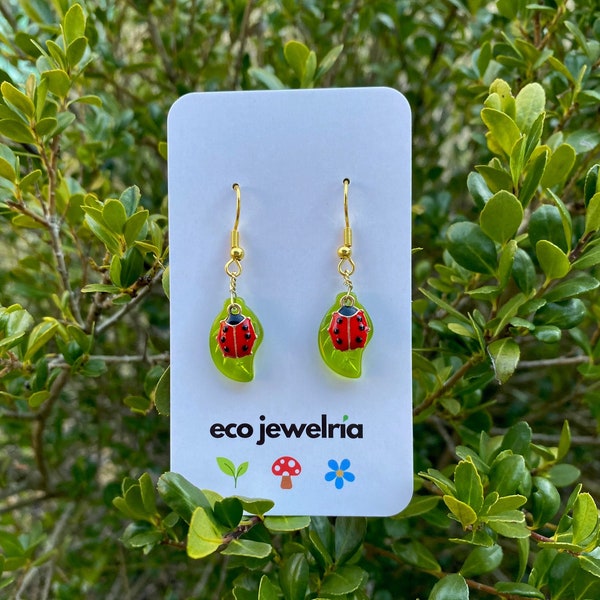 hypoallergenic ladybug and leaf earrings with 18K gold-plated hooks / enamel ladybug & peridot glass leaf charms / ecojewelria