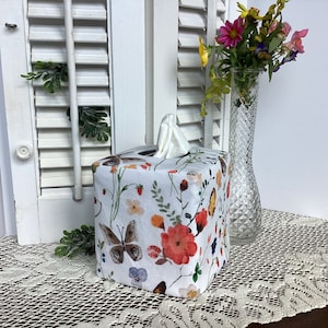 Meadow magic tissue box cover. An original design printed on petal signature cotton. A cheerful addition to almost any decor.