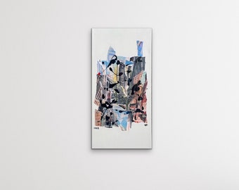 May include: Abstract collage artwork featuring a cityscape with buildings and trees in shades of blue, green, brown, and black. The artwork is framed with a white border.