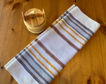 Vintage table runner with a brown and yellow design from Sweden