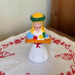 Lucia Figurine with A Tray