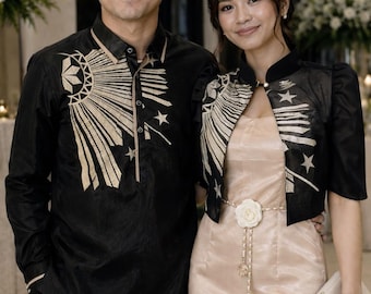 Filipino Couple Outfit Set – Black Barong Tagalog & Embroidered Bolero Modern Filipiniana with 'Sinag' Sunburst and Star Design.