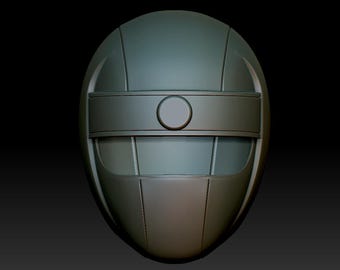 May include: A 3D printed model of a helmet with a dark gray color and a circular visor. The helmet has a raised band with a circular detail in the center.