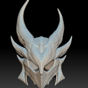 May include: A light gray fantasy helmet with large, curved horns and intricate detailing. The helmet features a pointed visor and is adorned with rivets. The overall design suggests a medieval or fantasy theme, suitable for cosplay or display.
