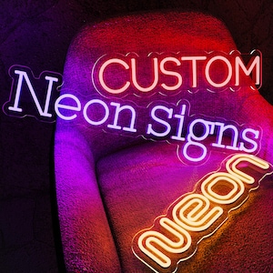 May include: A custom neon sign featuring the text CUSTOM in red, Neon Signs in purple, and neon in yellow, all mounted on clear acrylic backings with contoured edges. The signs emit a vibrant glow against a dark, textured background.