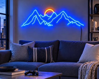 May include: A wall-mounted neon sign featuring a bright blue outline of a mountain range with a glowing orange circular sun positioned behind the peaks. The light emits a vibrant glow against the wall, creating a sharp contrast in the room.
