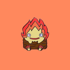 Calcifer Log Hard Enamel Pin | Studio Ghibli Enamel Pins | Anime Pins | Howl’s Moving Castle | Pastel | Cute | Animated Movies | Yellow Red