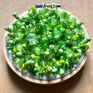Bright green beaded sequin embroidered art piece