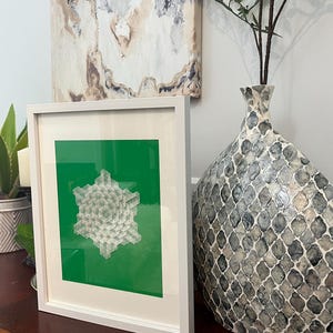 Handmade Origami paper abstract art geometric shape white  color Tessellation design with white frame rectangular frame