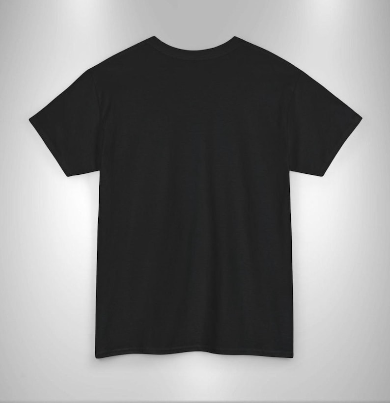 May include: A plain black t-shirt with short sleeves.