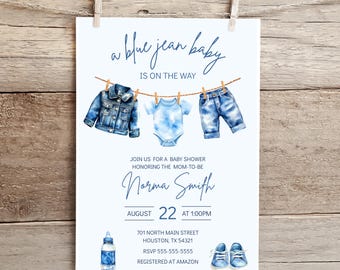May include: Baby shower invitation with a watercolor design. The invitation features a blue jean theme with a denim jacket, onesie, and jeans hanging on a clothesline. The text reads "a blue jean baby is on the way".