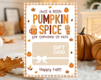 May include: A gift card with a fall theme. The card features the text "Just a little Pumpkin Spice for someone so nice" in orange and brown. The card has a light brown background with a bow and the words "Gift Card".