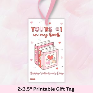May include: Printable gift tag with a pink background and a stack of three books with hearts on the cover. The text reads "You're #1 in my book" and "Happy Valentine's Day".
