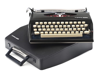 Tippa S typewriter built by Adler in 1971, elegant and beautiful. Excellent condition, revised and working.