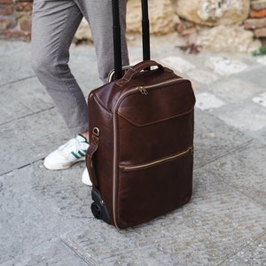 Handgemaakte Italiaanse leren rolkoffer, luxe Toscaanse leren handbagage, echt lederen reisbagage, dames- en herentas op wieltjes