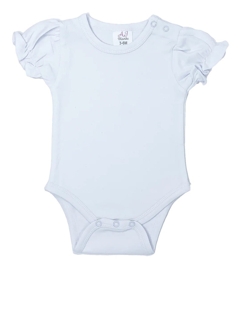 May include: A light blue baby onesie with short sleeves and a ruffled trim. The onesie has a round neckline and snaps at the bottom. The onesie has a label that says "A1 Blanks 3-6M".