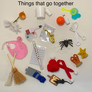 May include: A collection of miniature objects, including a flower, mug, bib, broom, pen, toy car, bowling pins, saxophone, spider, and a Santa hat. The image has the text "Things that go together" at the top.