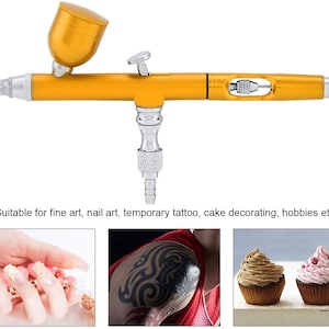 May include: Gold airbrush with a silver nozzle and a small cup on top. The airbrush is suitable for fine art, nail art, temporary tattoos, cake decorating, and hobbies.