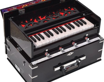May include: A black harmonium with a keyboard and decorative fretwork. The instrument has a red interior and silver hardware. The keys are white and black. The harmonium has a handle for carrying.