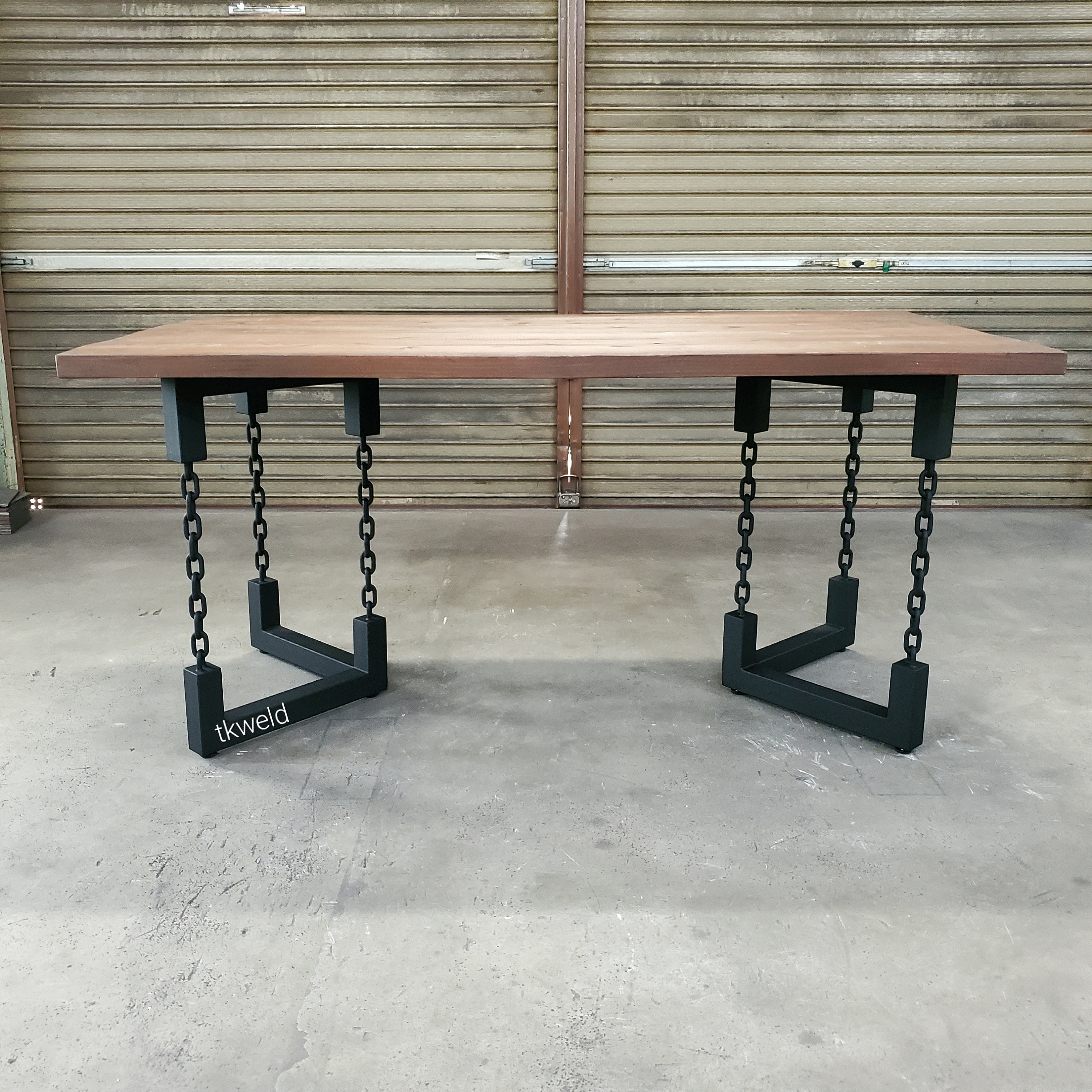 Table with chains for legs deals