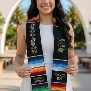 May include: A set of three ceramic canisters with lids, featuring a geometric pattern in shades of blue, white, and gray. The canisters vary in size, suitable for kitchen storage.
