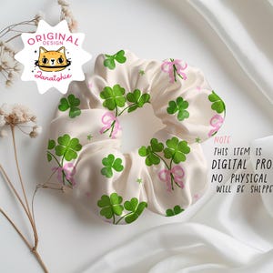 May include: A white satin scrunchie with a green four-leaf clover and pink bow print. The scrunchie is on a white surface. "NOTE: THIS ITEM IS DIGITAL PRODUCT. NO PHYSICAL ITEM WILL BE SHIPPED."