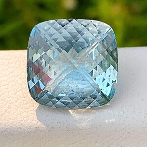 Swiss Blue Topaz: 5.70 Cts, 11x11mm Cushion Cut Gemstone