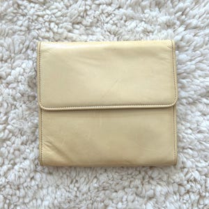 vintage Salvatore Ferragamo leather cream purse with shoulder strap made in Italy serial number A219046