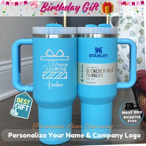 Premium personalized 40oz Stanley tumblers with high-definition laser-engraved logos and names. A clean, minimalist display of bulk custom drinkware for business and bachelorette groups.