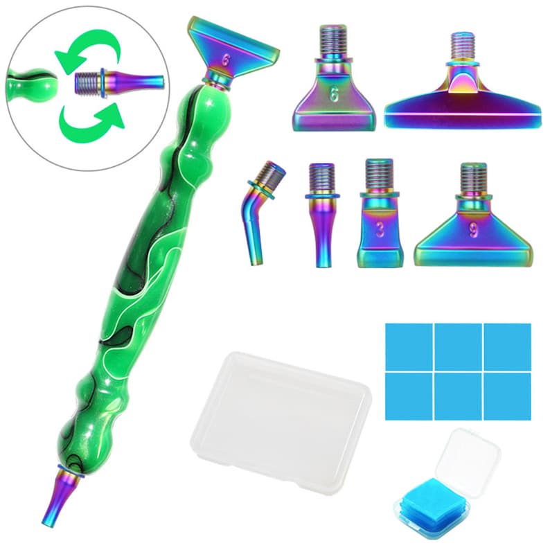 May include: A green and black diamond painting pen with interchangeable iridescent tips. Includes a clear plastic case, blue wax squares, and additional iridescent pen tips with numbers 3, 6, and 9. The pen has a curved, ergonomic design.